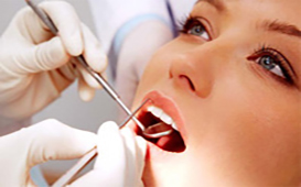 Woman receiving dental examination